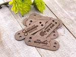 Custom Ultrasuede Tags - Rounded Rectangular - Sew On - 1.75 x 0.5 in.